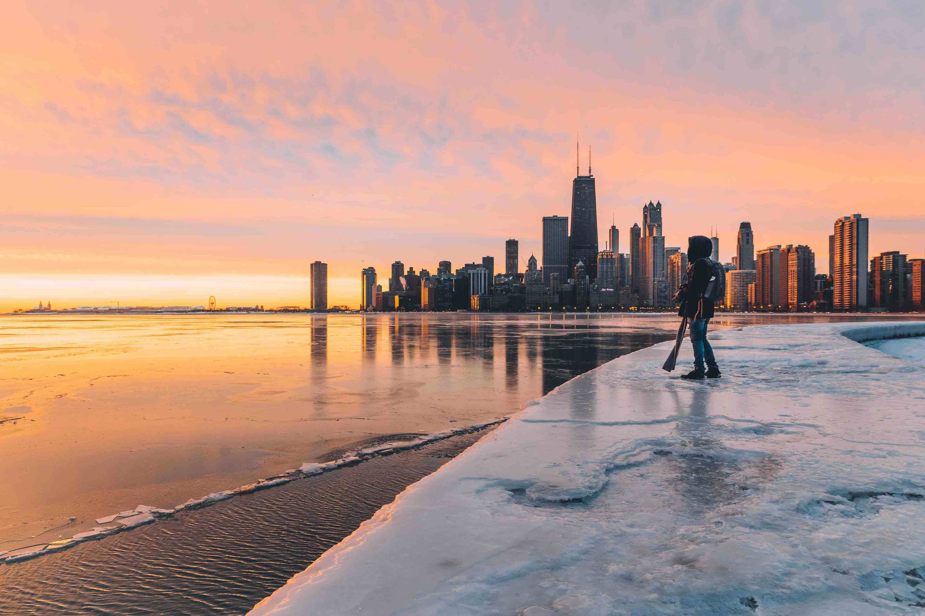 A sunrise in Chicago waterfront with myself standing on the edge of a pathway
